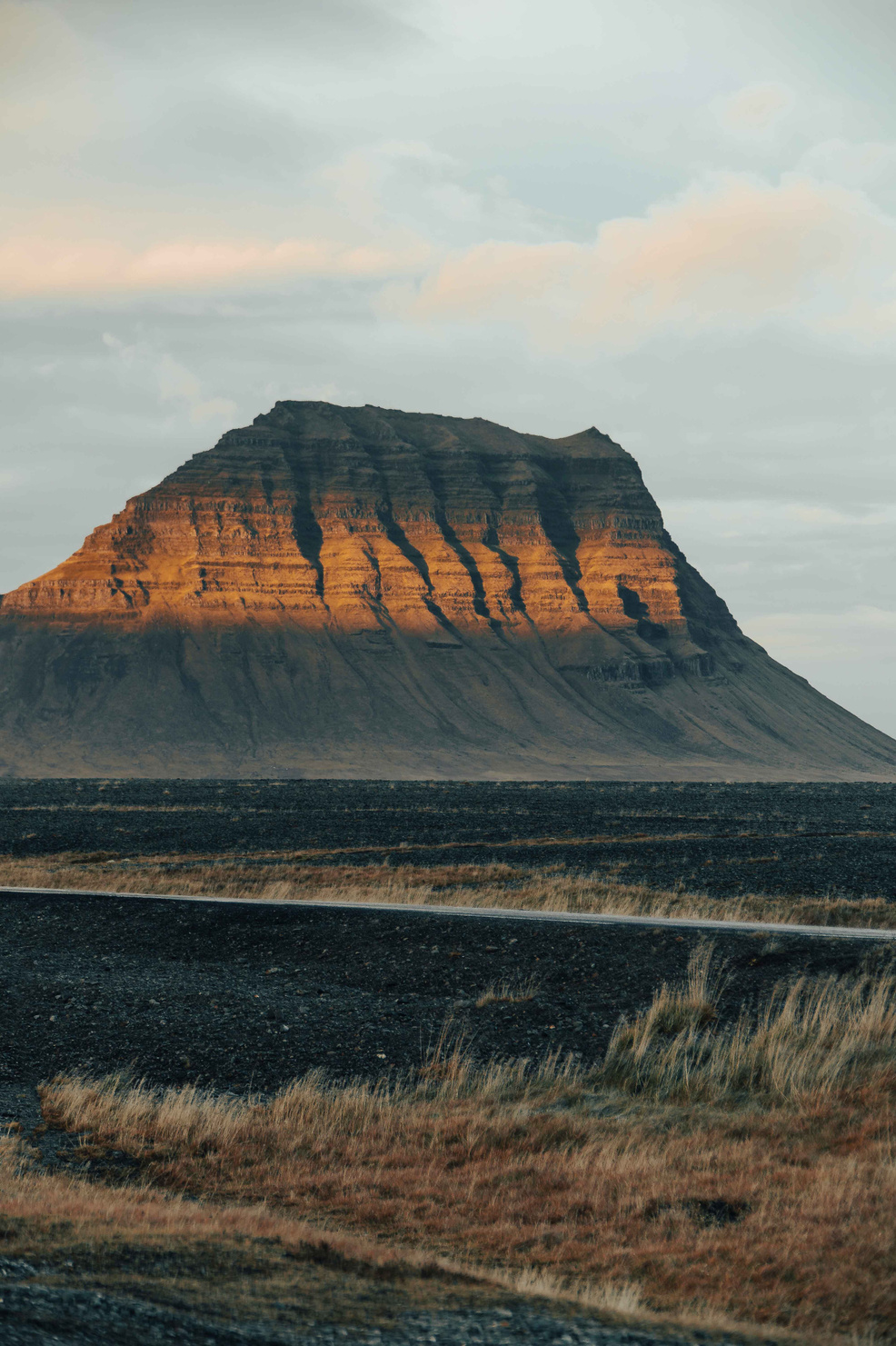 Side Profile of Kirkjufell Kirkjufell: A magnificent side profile of the iconic mountain, revealing its captivating form and grandeur.